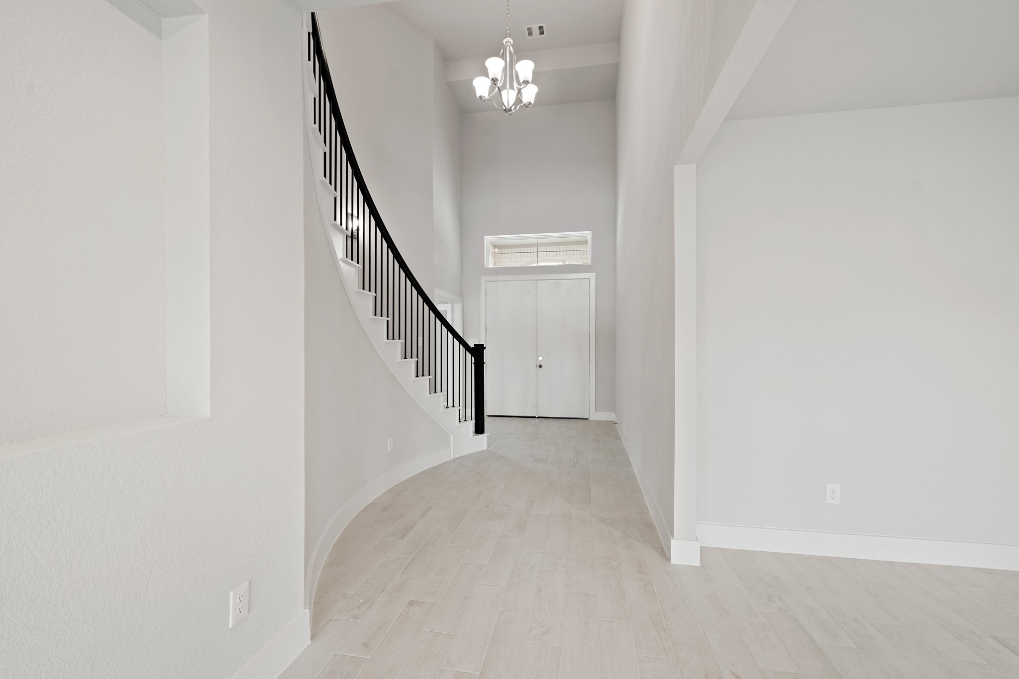 3319 Pin Cherry Lane Conroe, TX 77301 - Photo 5 of 30 a view of a livingroom with stairs
