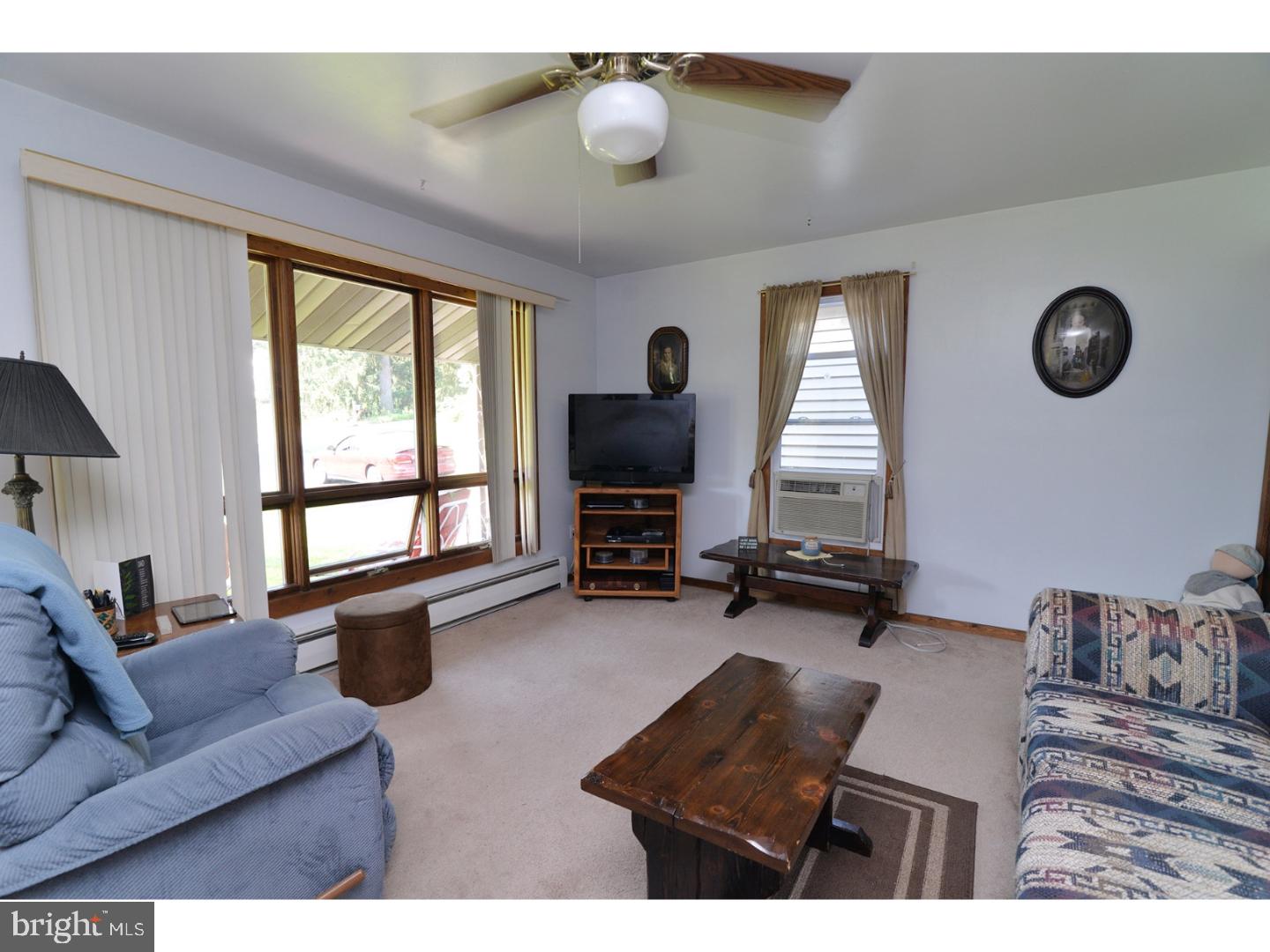307 Germanville Road Ashland, PA 17921 - Photo 4 of 24 a living room with furniture and a flat screen tv