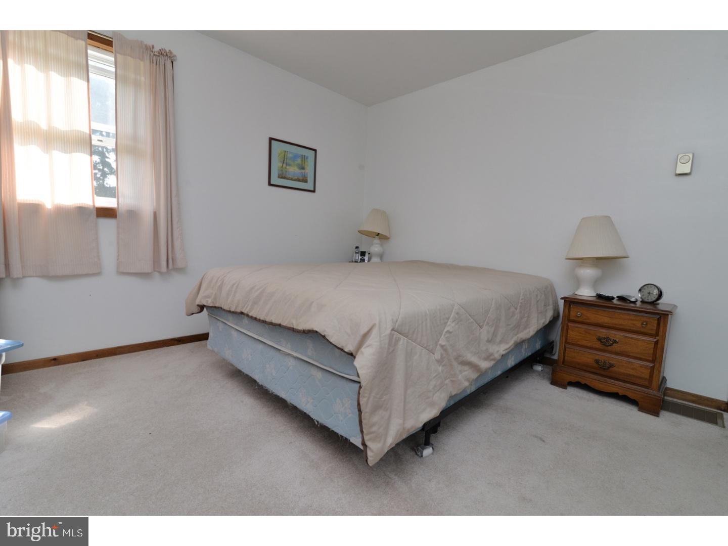 307 Germanville Road Ashland, PA 17921 - Photo 8 of 24 a bedroom with a bed and window