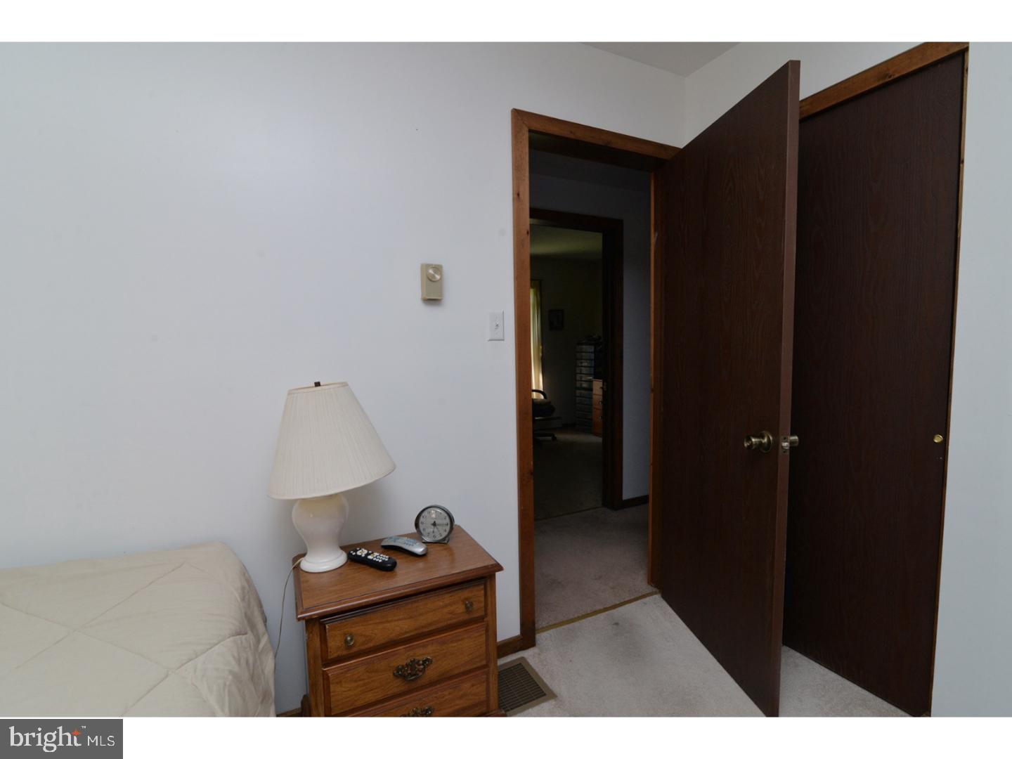 307 Germanville Road Ashland, PA 17921 - Photo 9 of 24 a living room with a bed and a dresser