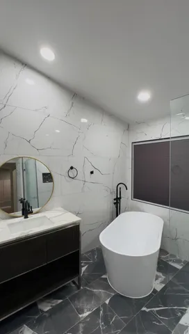 a building outdoor space with patio furniture and potted plants