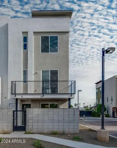 a front view of a house with garage