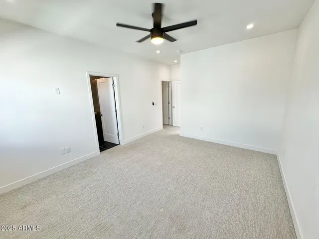 a bathroom with a double vanity sink mirror and