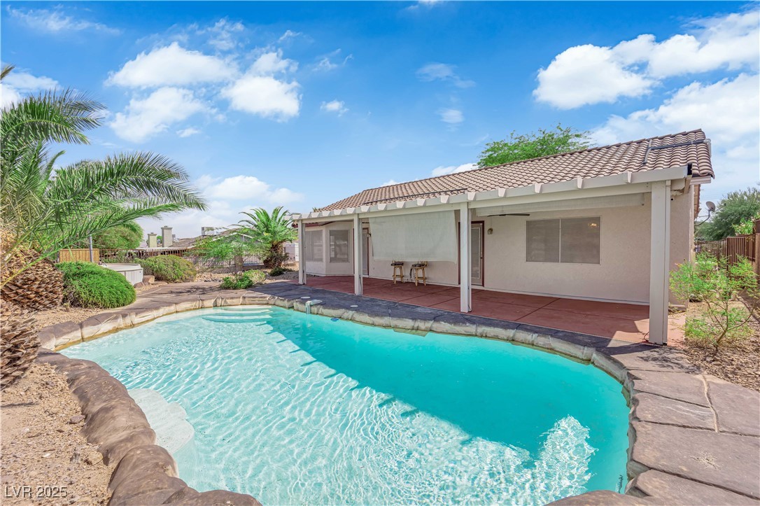 650 West Victory Road Henderson, NV 89015 - Photo 23 of 35 View of pool featuring a patio and a sunroom