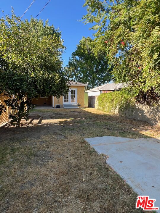 17844 Hartland Street Reseda, CA 91335 - Photo 16 of 18 a view of a house with a yard