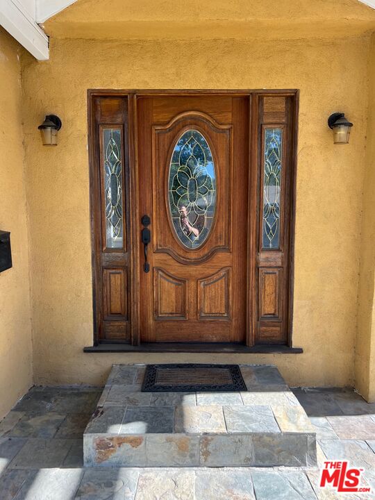 17844 Hartland Street Reseda, CA 91335 - Photo 2 of 18 a view of a door with an outdoor space