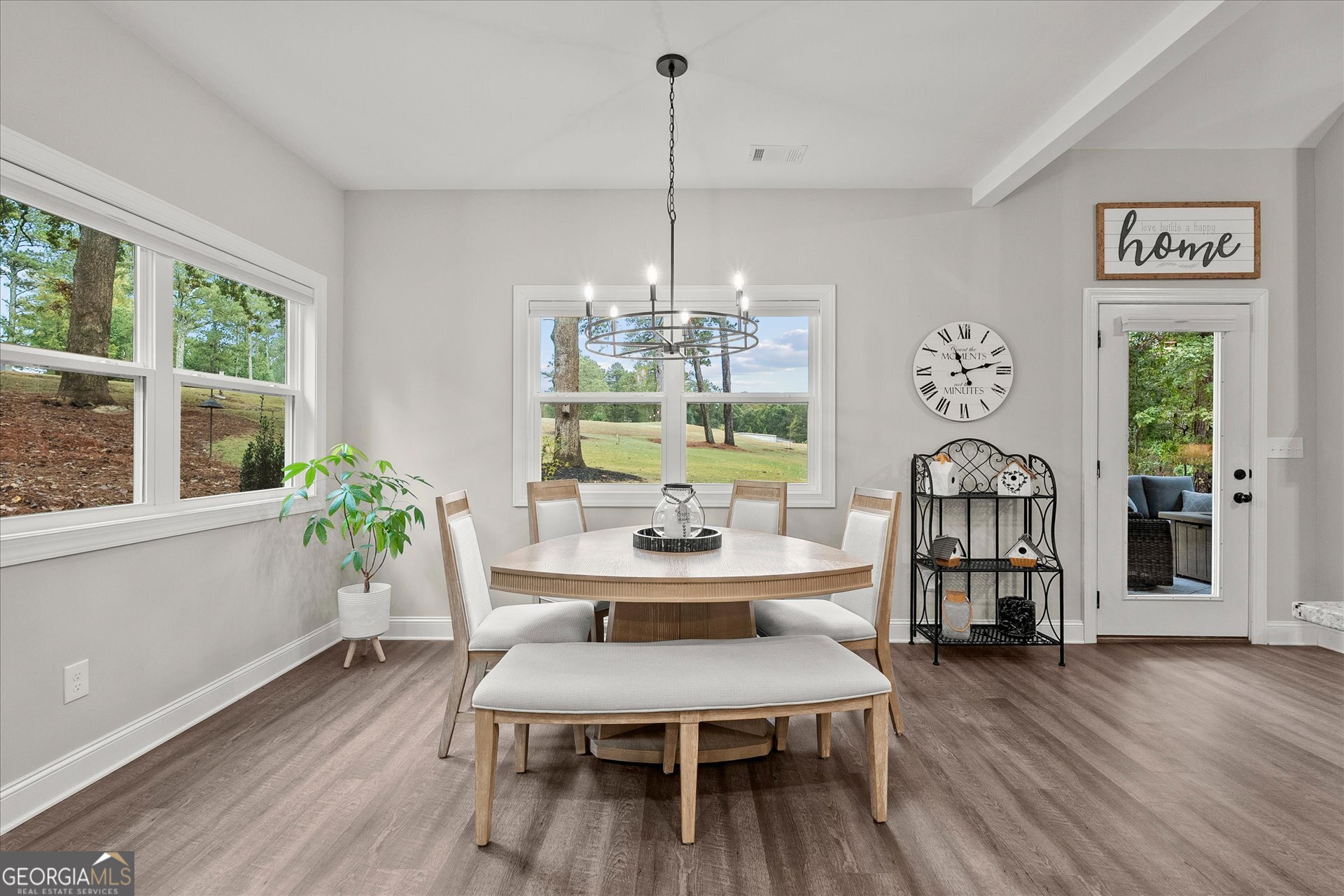 3260 Greenhill Court Villa Rica, GA 30180 - Photo 16 of 80 a view of a dining room with furniture window and wooden floor
