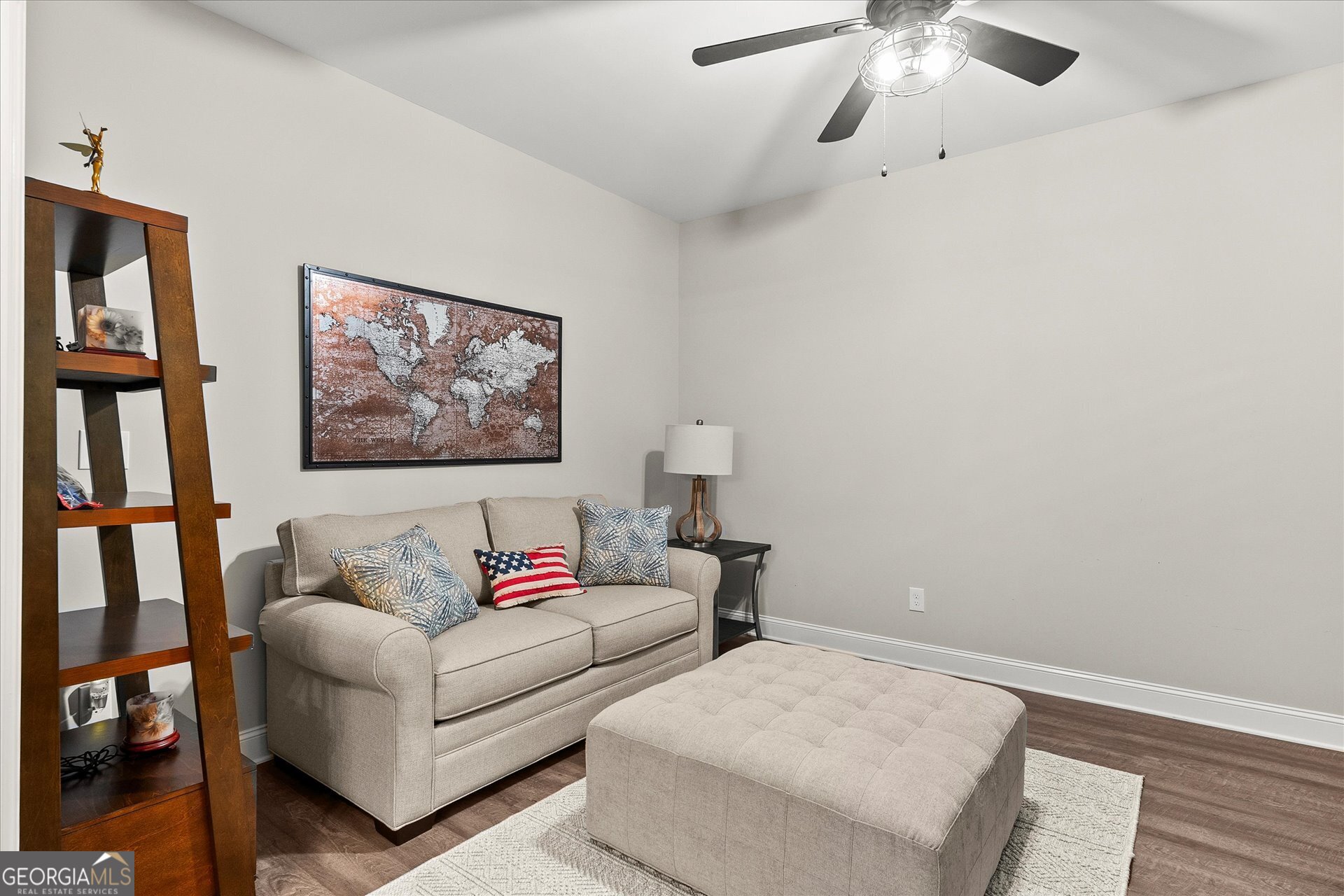 3260 Greenhill Court Villa Rica, GA 30180 - Photo 28 of 80 a living room with furniture and a painting on the wall