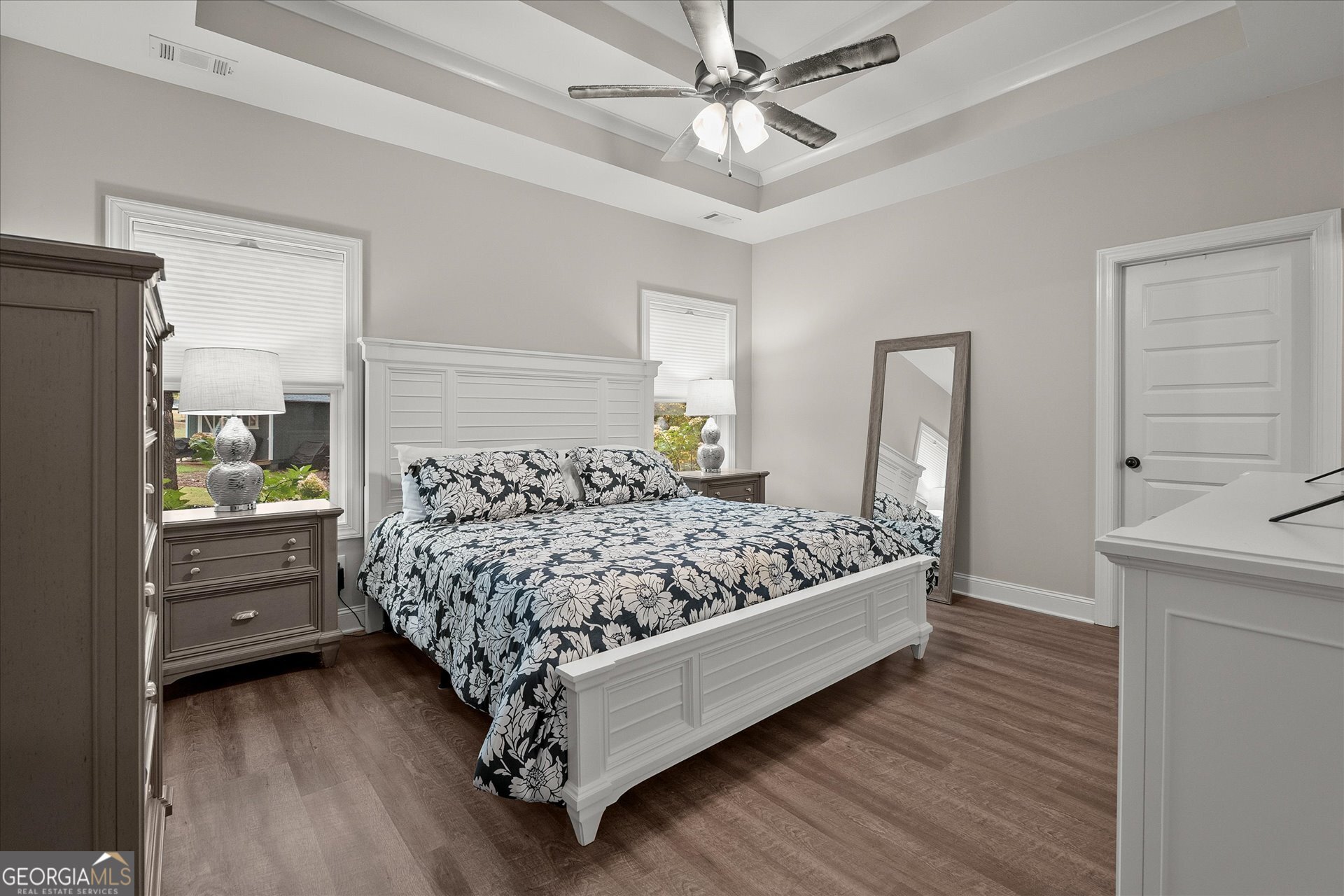 3260 Greenhill Court Villa Rica, GA 30180 - Photo 30 of 80 a bed sitting in a bedroom next to a window