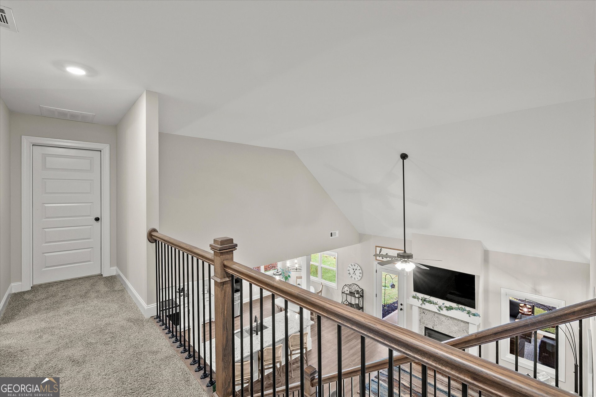 3260 Greenhill Court Villa Rica, GA 30180 - Photo 38 of 80 a view of a hallway with an empty room and flat screen tv