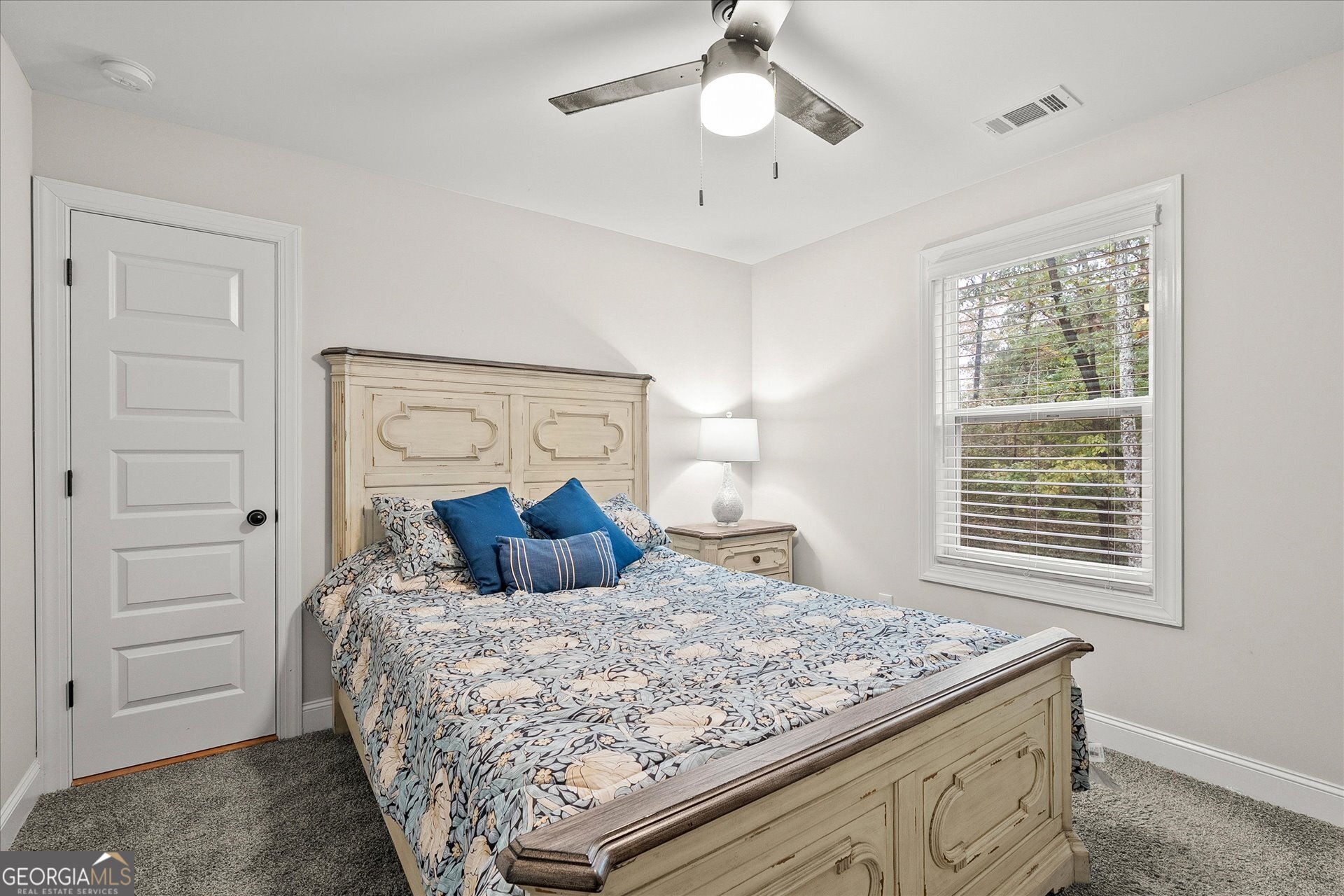 3260 Greenhill Court Villa Rica, GA 30180 - Photo 39 of 80 a bedroom with a large bed and a window