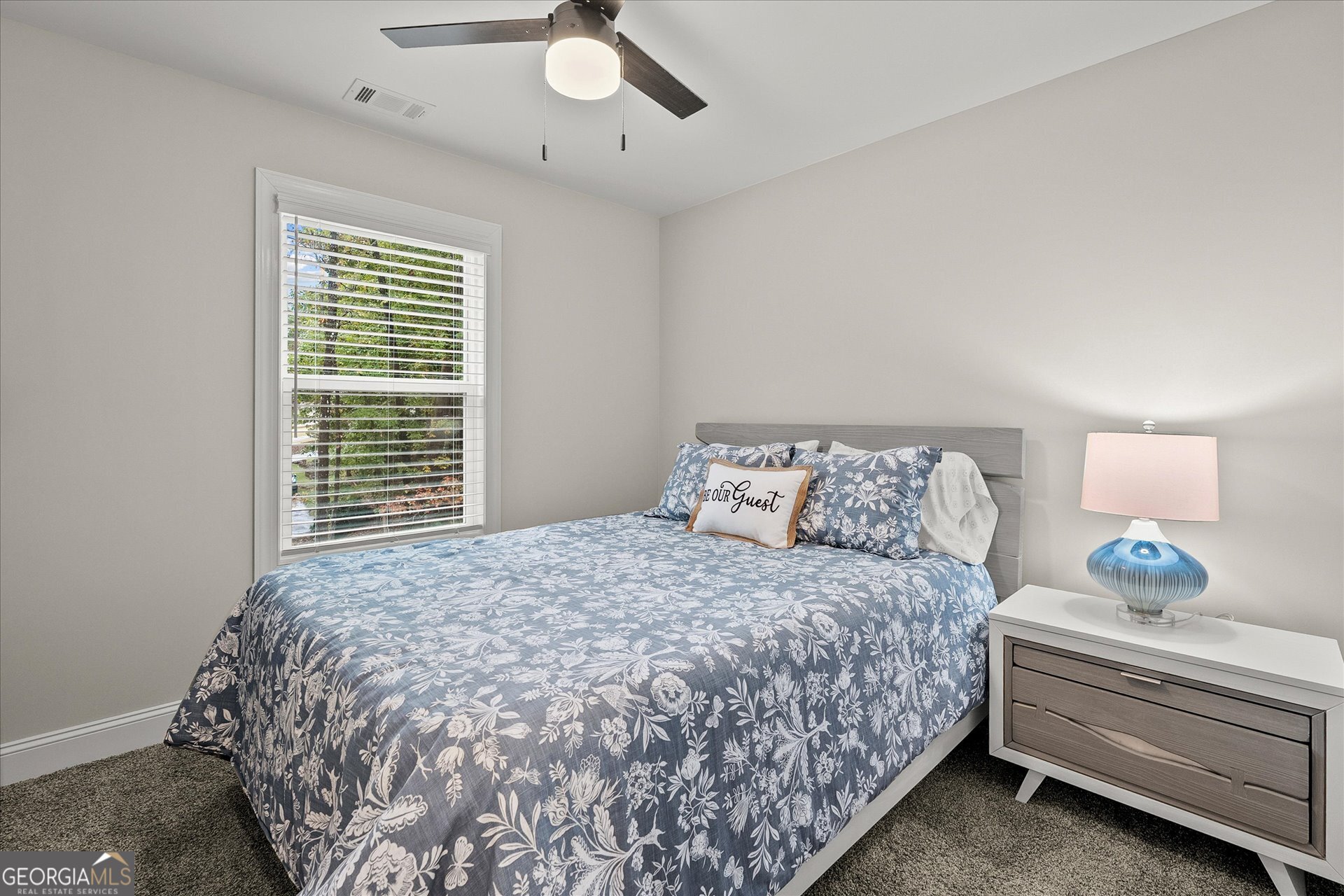 3260 Greenhill Court Villa Rica, GA 30180 - Photo 40 of 80 a bedroom with a bed and a window