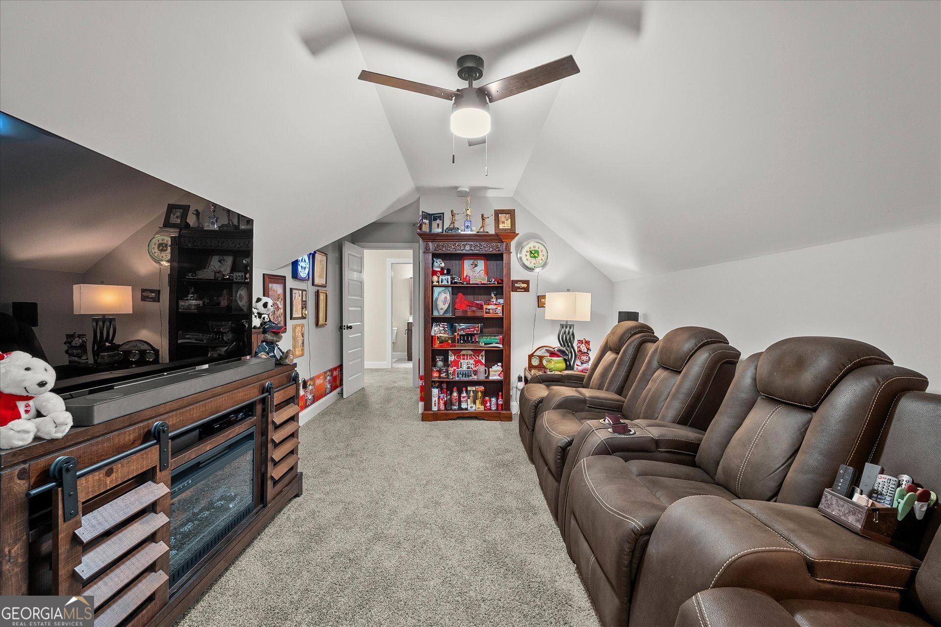 3260 Greenhill Court Villa Rica, GA 30180 - Photo 43 of 80 a living room with furniture and a flat screen tv