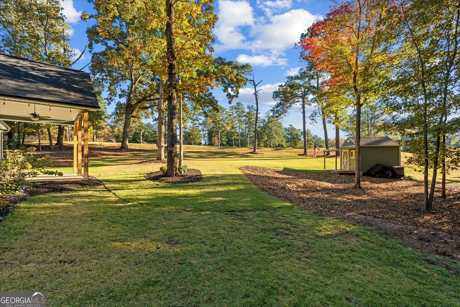 3260 Greenhill Court Villa Rica, GA 30180 - Photo 48 of 80 a view of a house with a big yard and large trees