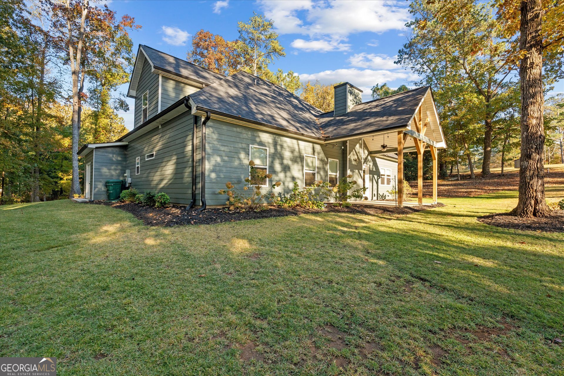 3260 Greenhill Court Villa Rica, GA 30180 - Photo 49 of 80 a view of a house with a big yard and large trees