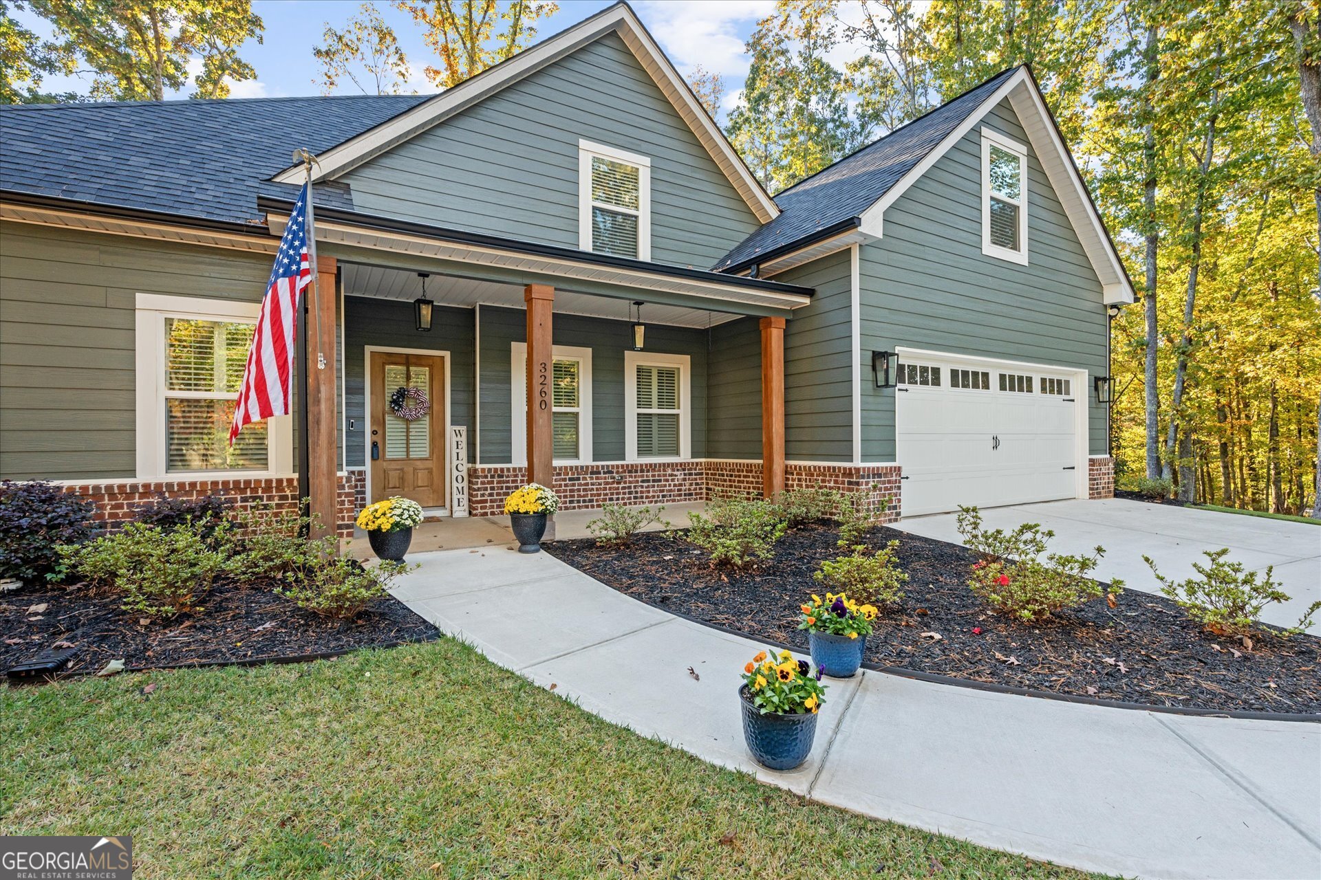 3260 Greenhill Court Villa Rica, GA 30180 - Photo 6 of 80 a front view of a house with a garden