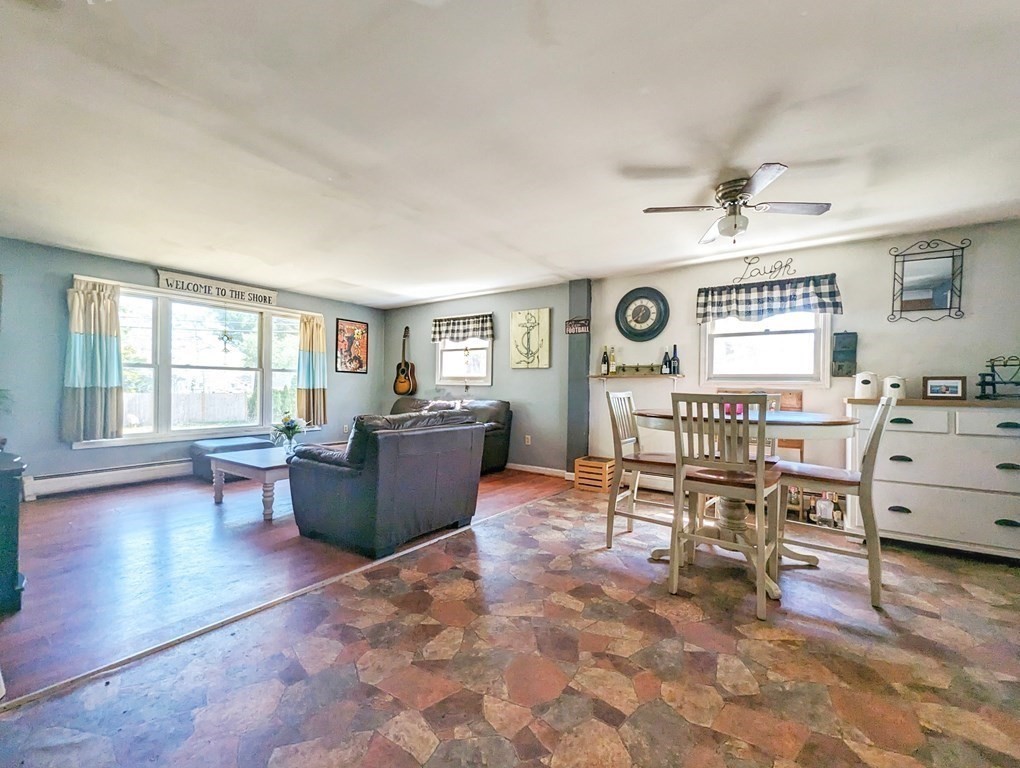 30 Cohasset Road Buzzards Bay, MA 02532 - Photo 6 of 24 a living room with furniture and a large window