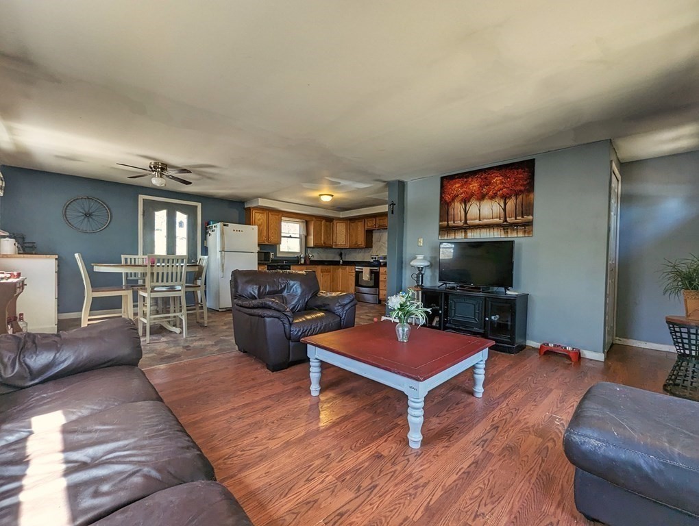 30 Cohasset Road Buzzards Bay, MA 02532 - Photo 7 of 24 a living room with furniture and a flat screen tv