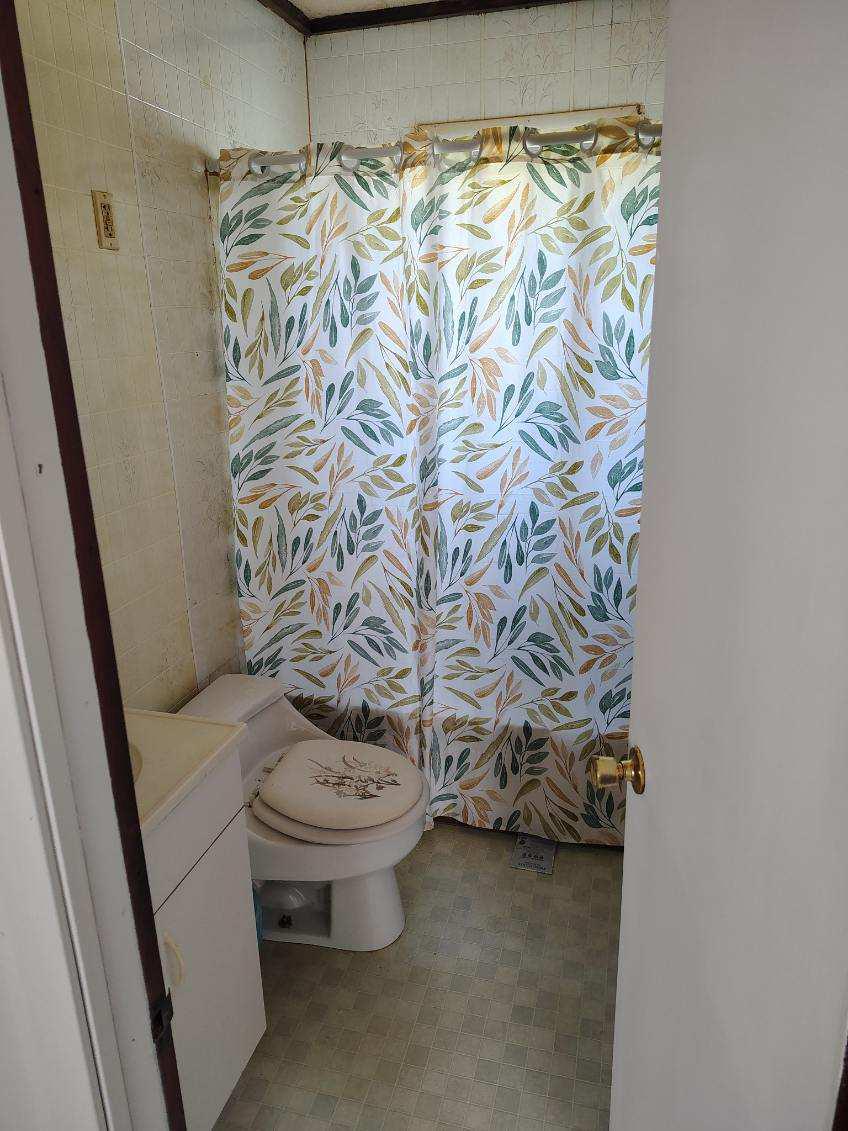 10762 Toddville Road Chance, MD 21821 - Photo 11 of 15 Bathroom with tub and natural light