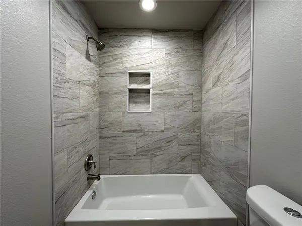 a bathroom with a bathtub