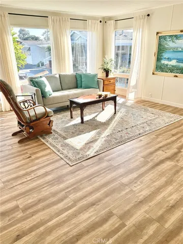a living room with couch and a table