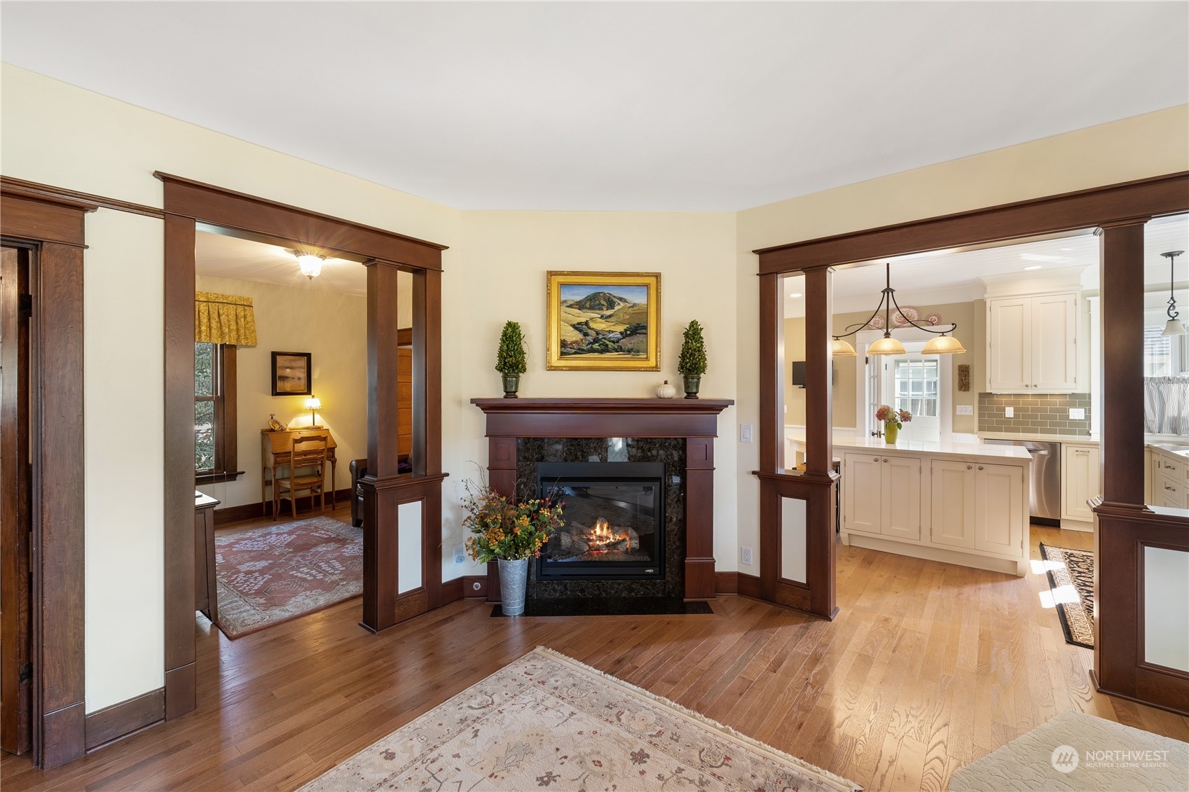 1317 9th Street Anacortes, WA 98221 - Photo 11 of 38 a living room with furniture and a fireplace