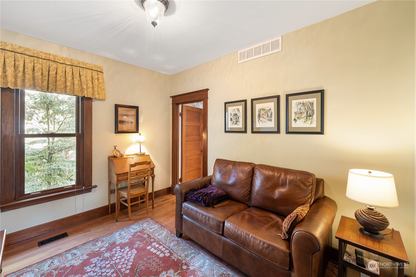1317 9th Street Anacortes, WA 98221 - Photo 14 of 38 a living room with furniture and a window
