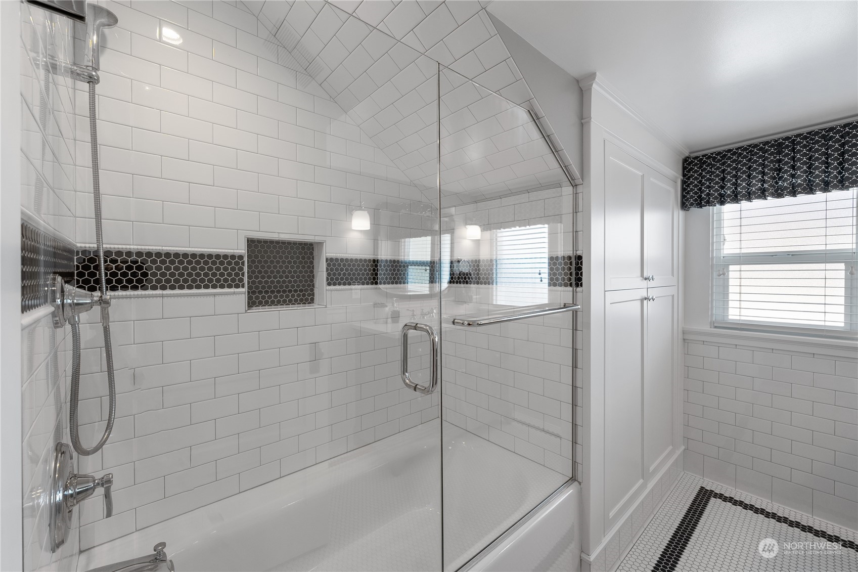 1317 9th Street Anacortes, WA 98221 - Photo 28 of 38 a bathroom with a shower