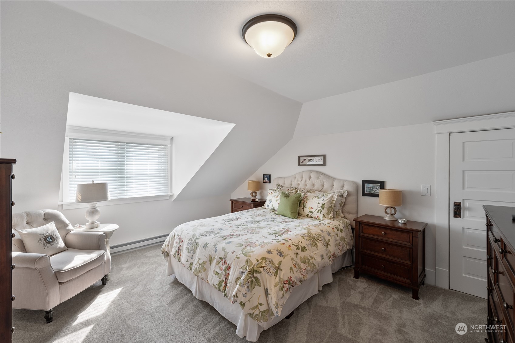 1317 9th Street Anacortes, WA 98221 - Photo 30 of 38 a bedroom with a bed and window