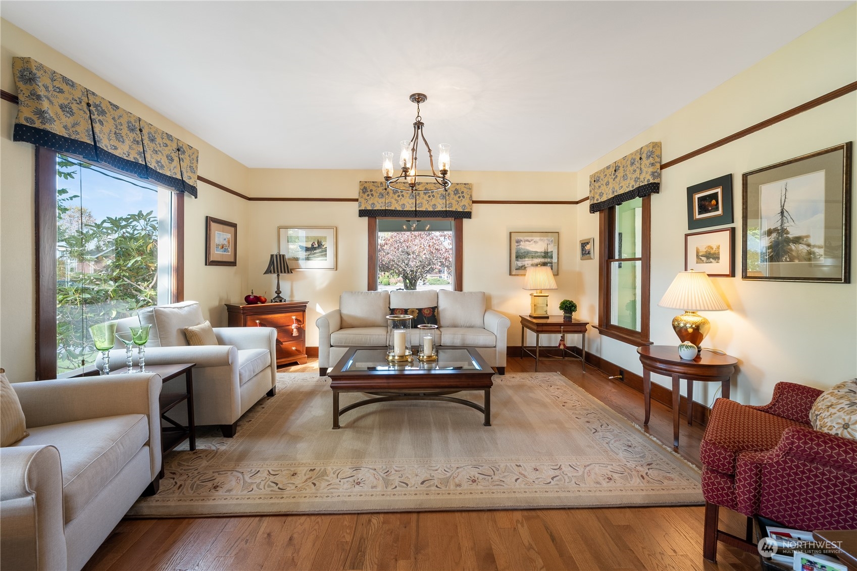 1317 9th Street Anacortes, WA 98221 - Photo 6 of 38 a living room with fireplace furniture and a large window