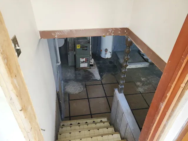 a bathroom with a sink and washing machine