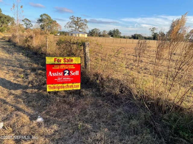 a sign board with ocean view