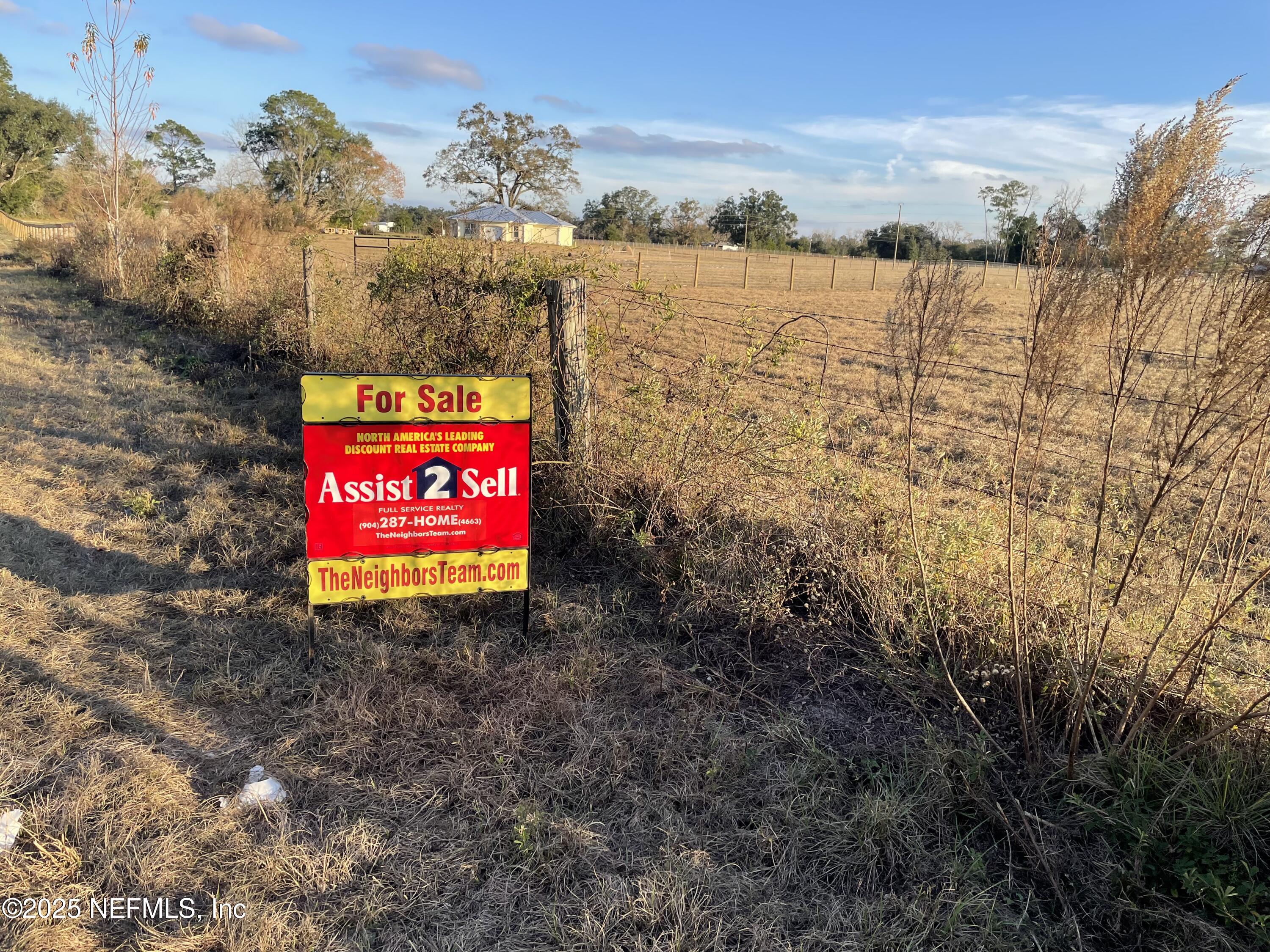 8516 240th Street O'Brien, FL 32071 - Photo 8 of 12 a sign board with ocean view