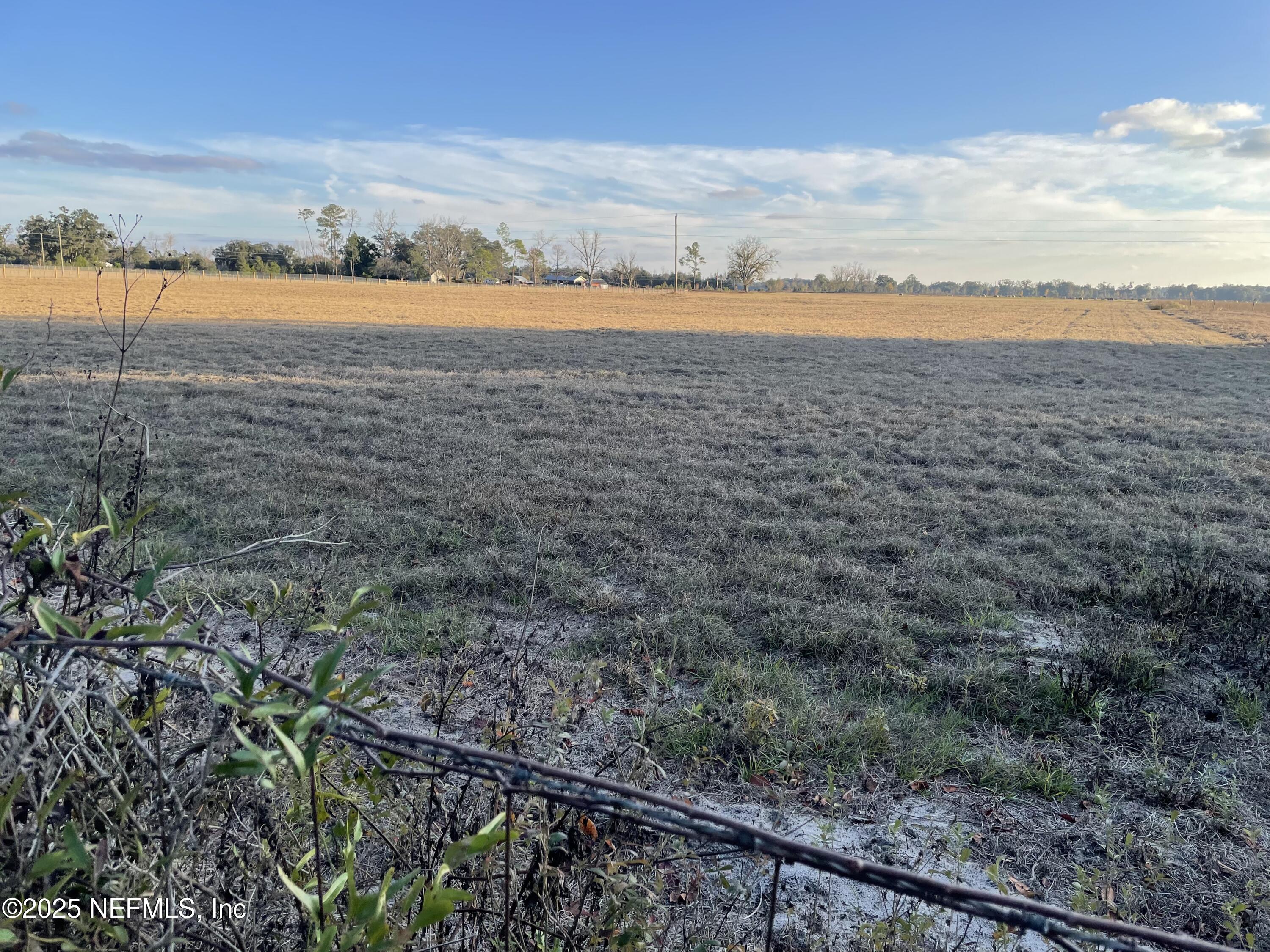 8516 240th Street O'Brien, FL 32071 - Photo 9 of 12 a view of an ocean and beach