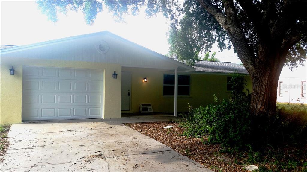 694 Azure Road Venice, FL 34293 - Photo 1 of 1 front view of a house with a yard