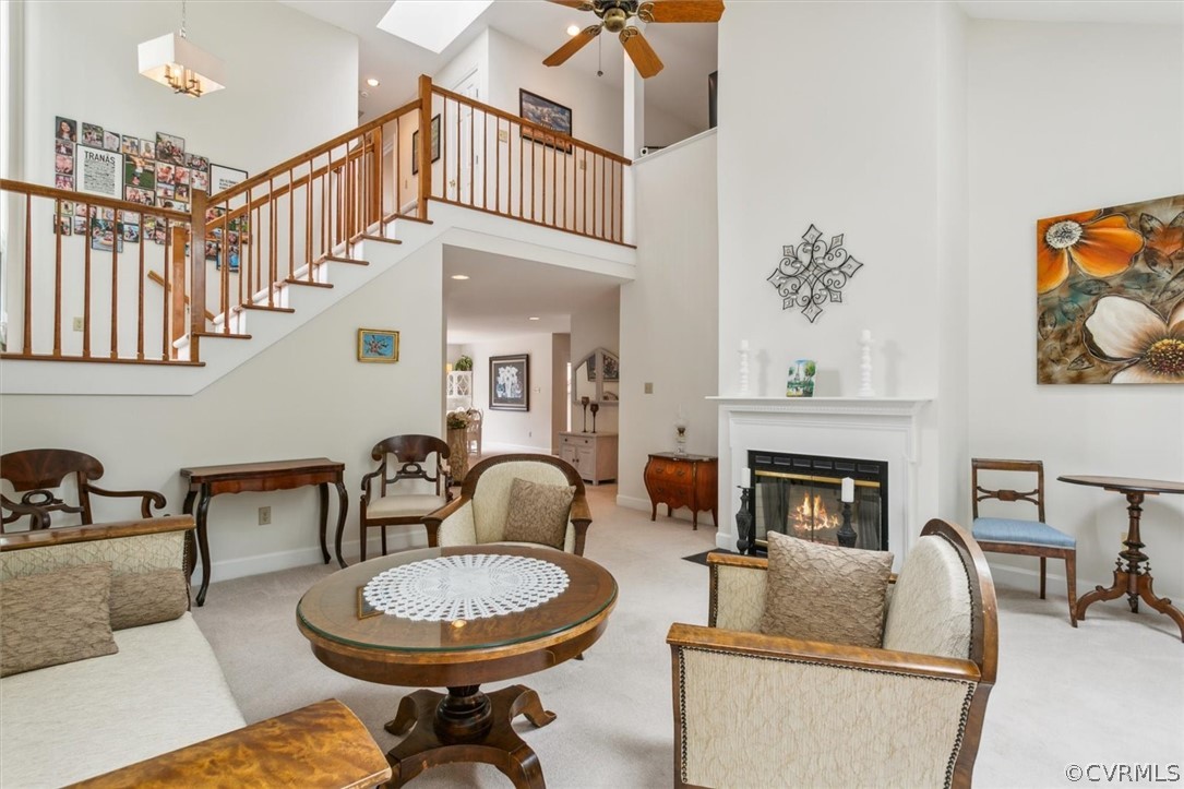 118 Harrops Glen Williamsburg, VA 23185 - Photo 12 of 44 a living room with furniture a fireplace and a potted plant