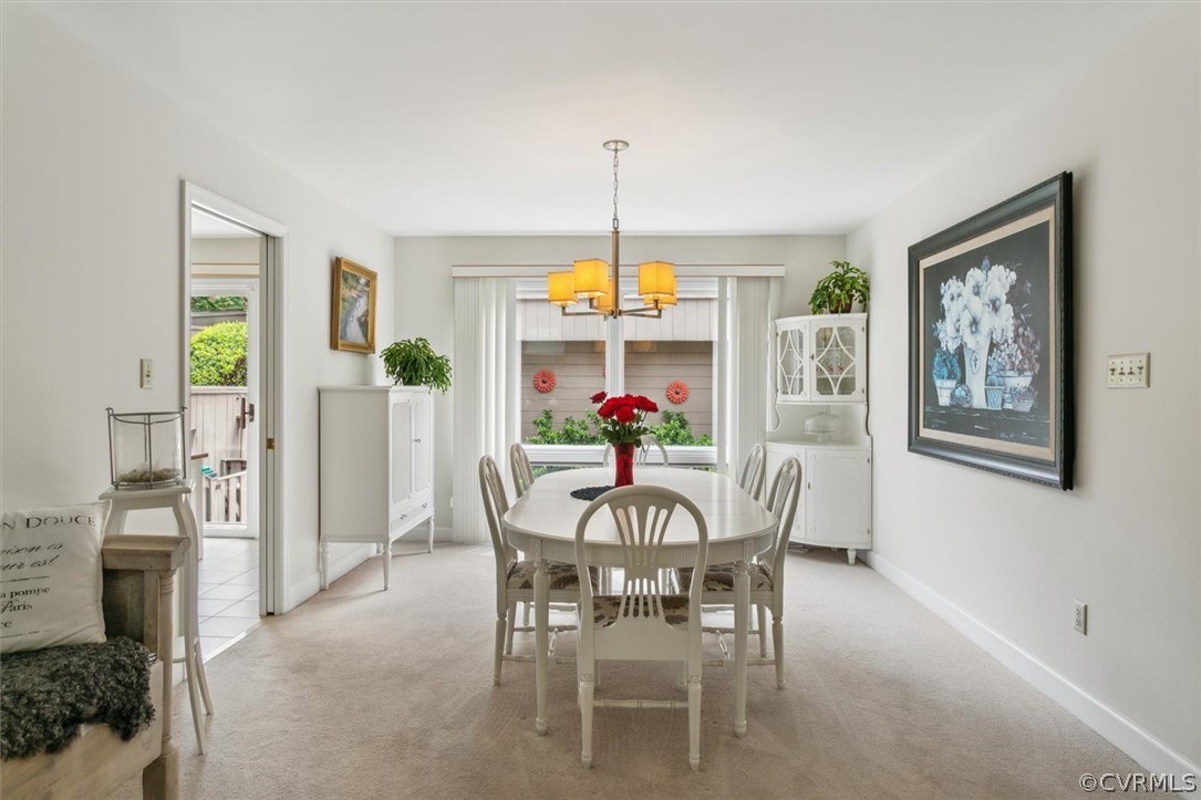 118 Harrops Glen Williamsburg, VA 23185 - Photo 9 of 44 a dining room with furniture window wooden floor