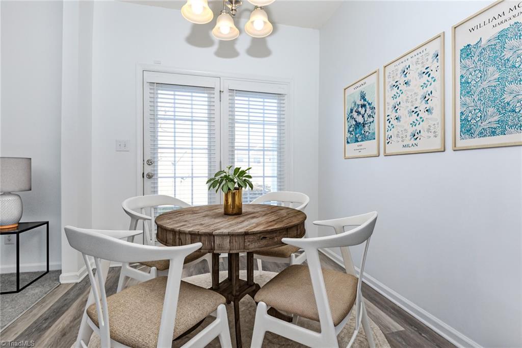 1161 Glory Vine Road Whitsett, NC 27377 - Photo 16 of 43 Breakfast space virtually staged.