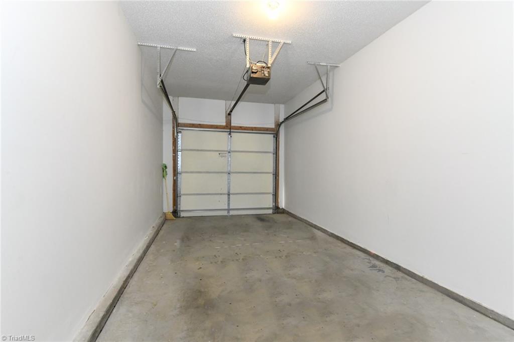 1161 Glory Vine Road Whitsett, NC 27377 - Photo 21 of 43 one car garage