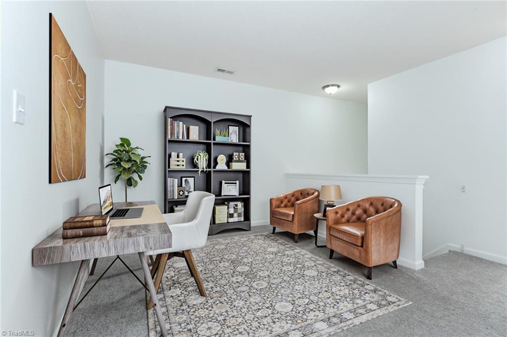 1161 Glory Vine Road Whitsett, NC 27377 - Photo 23 of 43 Loft staged as office