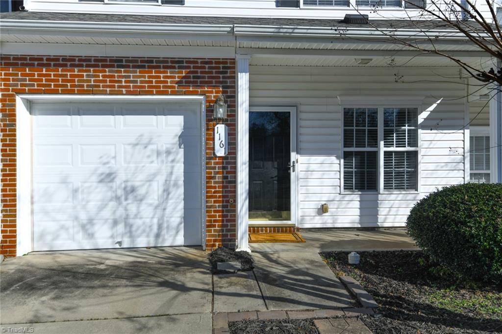 1161 Glory Vine Road Whitsett, NC 27377 - Photo 3 of 43 One car attached garage and porch.
