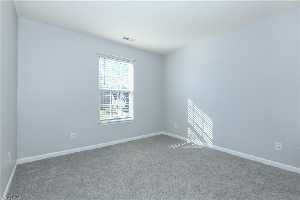 1161 Glory Vine Road Whitsett, NC 27377 - Photo 32 of 43 Bedroom 3