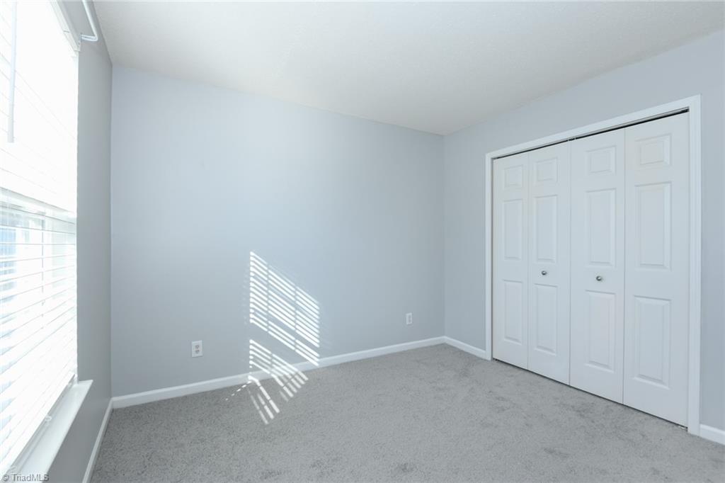 1161 Glory Vine Road Whitsett, NC 27377 - Photo 33 of 43 Bedroom 3
