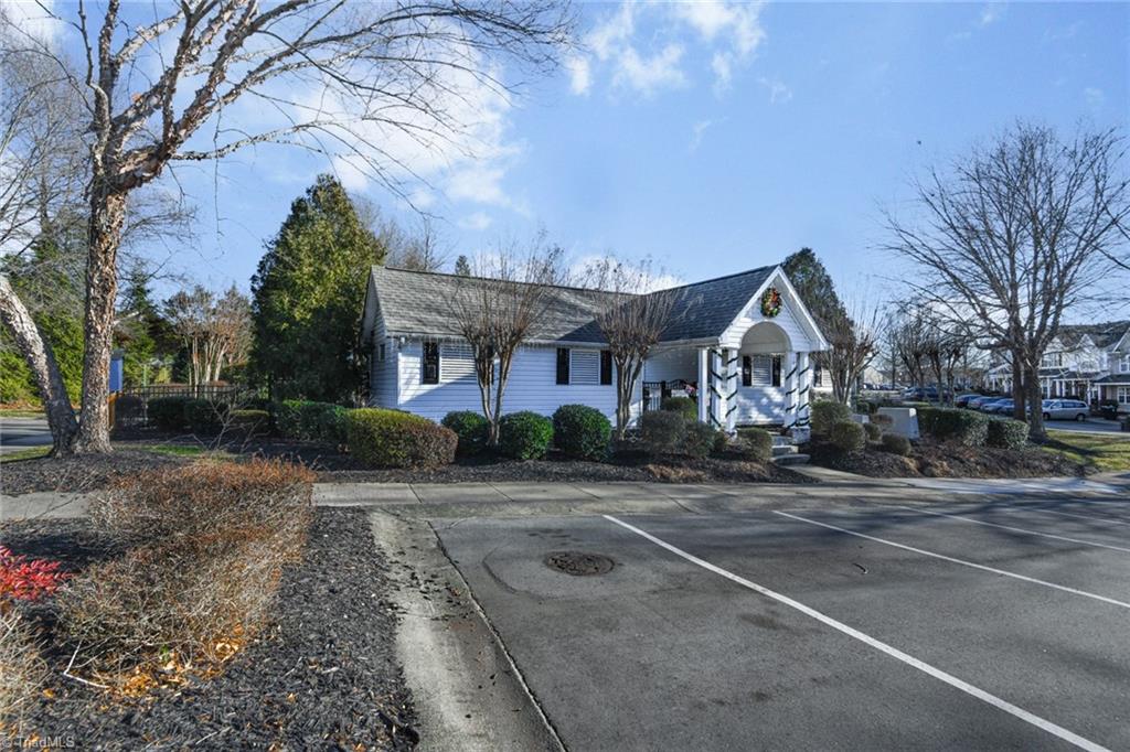 1161 Glory Vine Road Whitsett, NC 27377 - Photo 42 of 43 Pool and clubhouse.