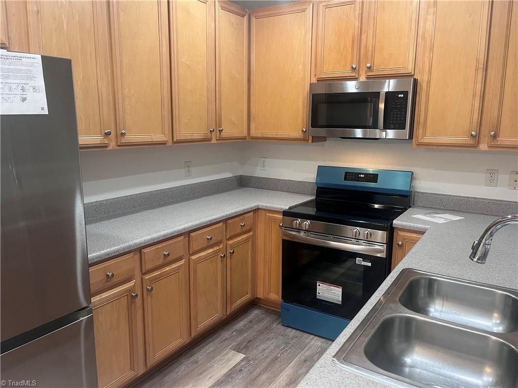 1161 Glory Vine Road Whitsett, NC 27377 - Photo 10 of 43 All new appliances.