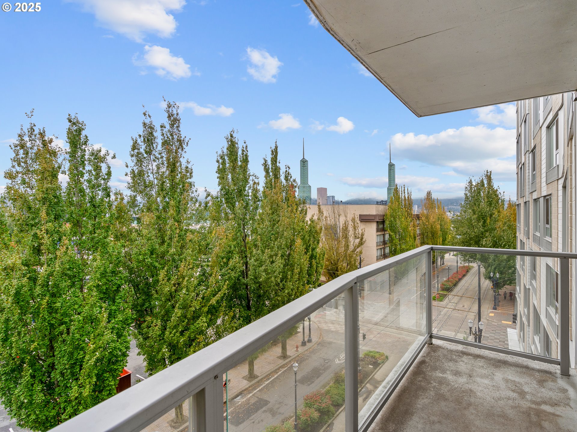 533 Northeast Holladay Street, Unit 605 Portland, OR 97232 - Photo 28 of 42 a view of a balcony with an outdoor space