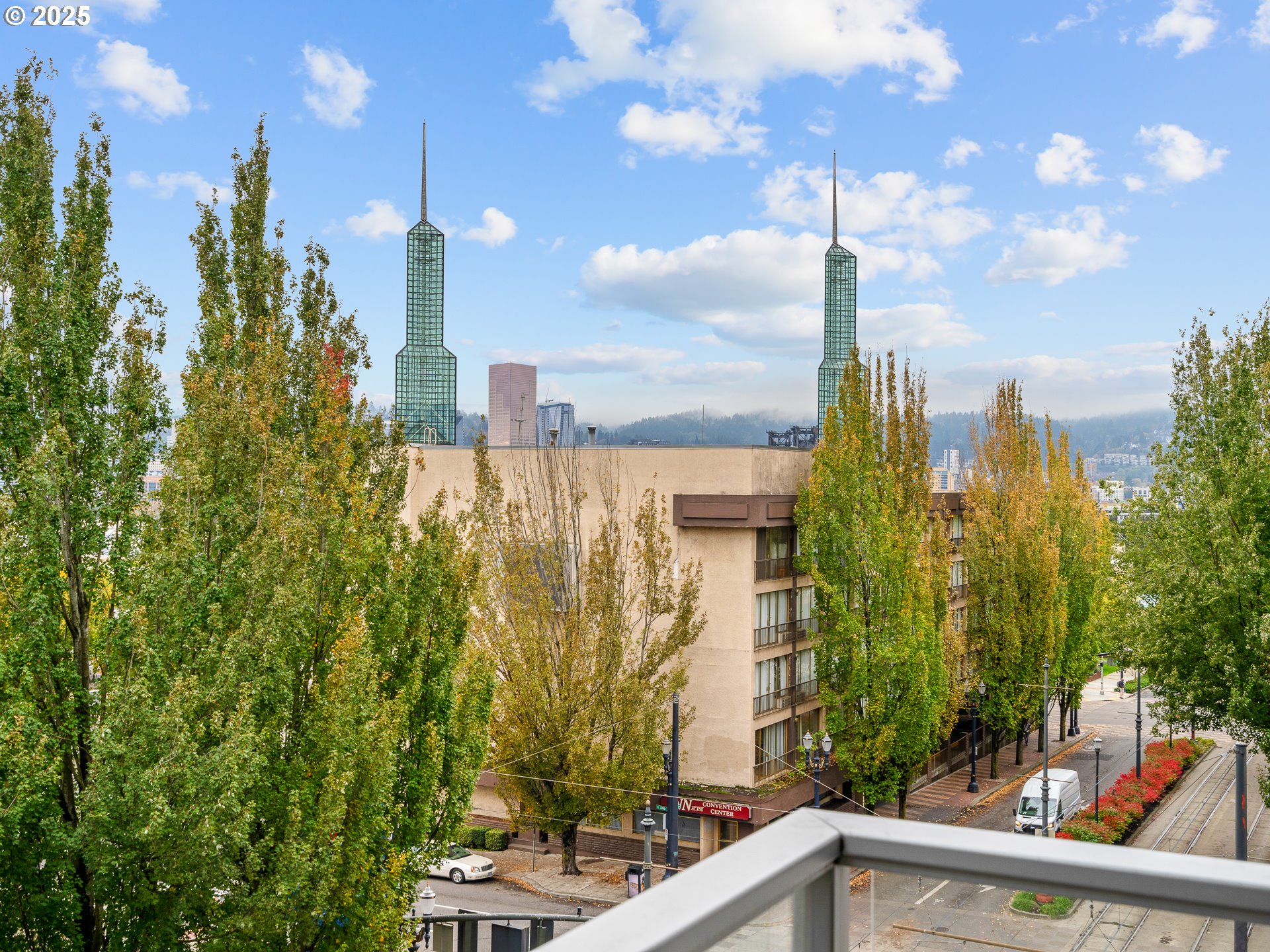 533 Northeast Holladay Street, Unit 605 Portland, OR 97232 - Photo 29 of 42 a view of a city and trees