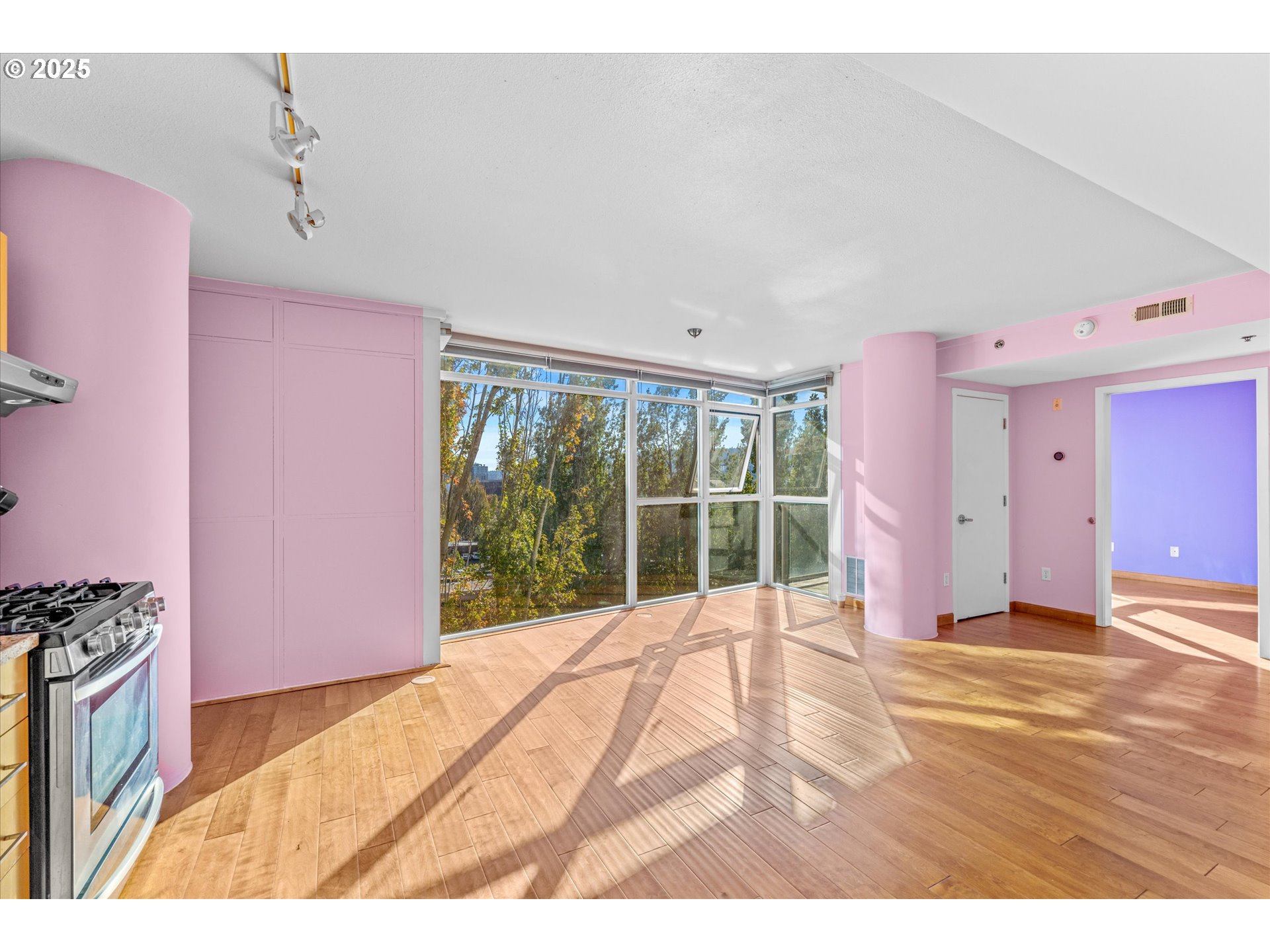 533 Northeast Holladay Street, Unit 605 Portland, OR 97232 - Photo 8 of 42 a view of an empty room with a window