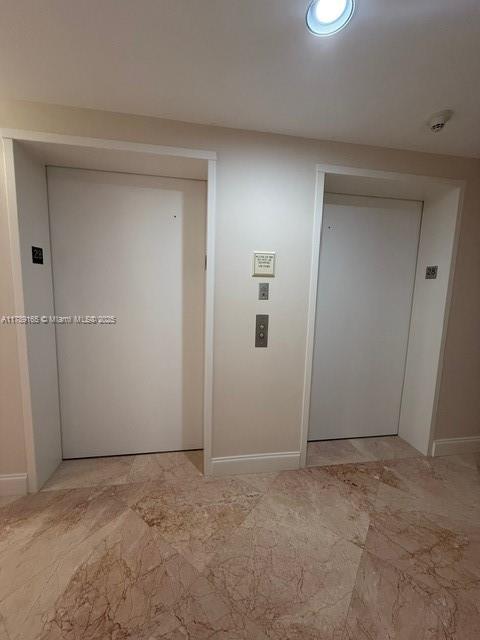 18911 Collins Avenue, Unit 2804 Sunny Isles Beach, FL 33160 - Photo 11 of 38 a view of an empty room