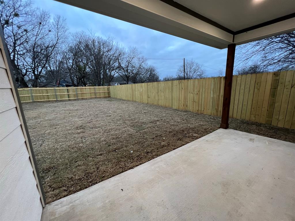 402 North Elliott Avenue Sherman, TX 75090 - Photo 17 of 19 a view of a backyard